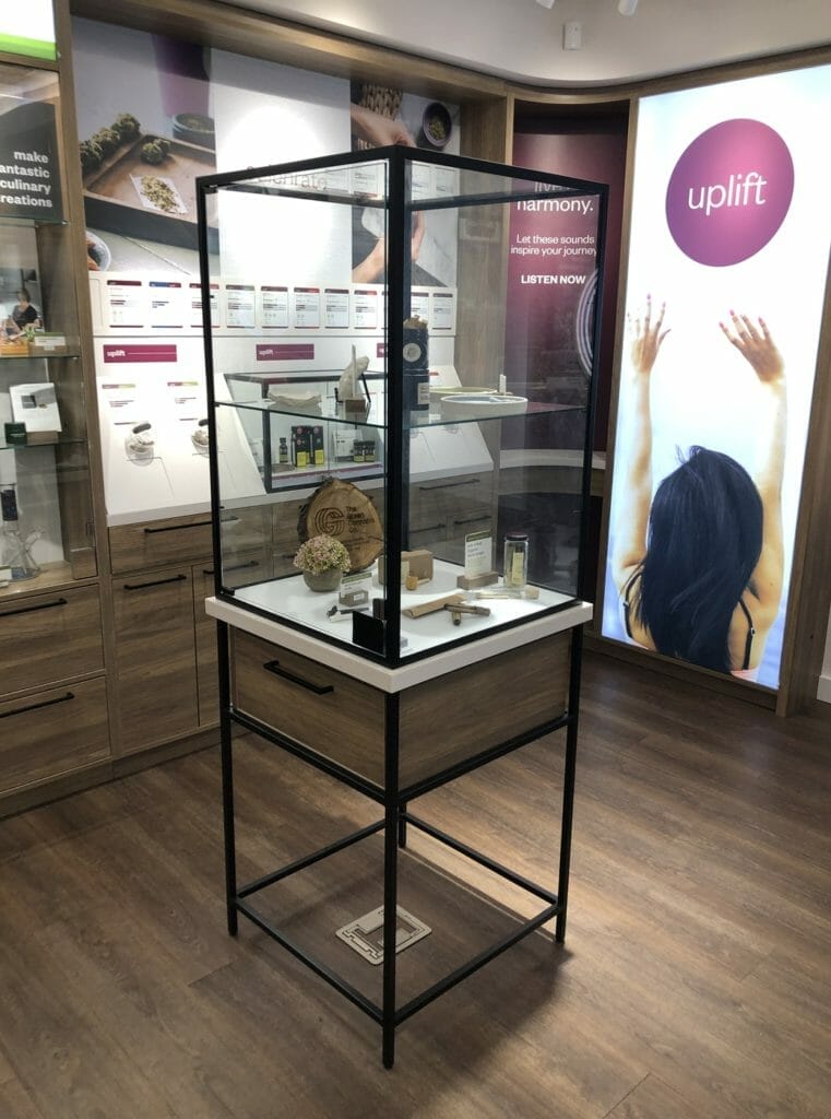 Floorstanding glass and metal display case